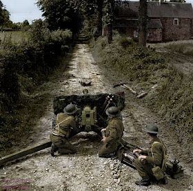 A British Soldiers from the 50th Northumbrian Division using a a anti-tank gun QF 6 57mm (6 pounder - ATK/Mk II) in an important way in the area of Lingèvres, Lower-Normandy , June 16, 1944.