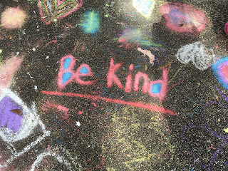 chalk drawing with the words Be Kind