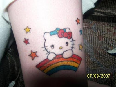 Have a look at these pictures of people with delightful rainbow tattoos.