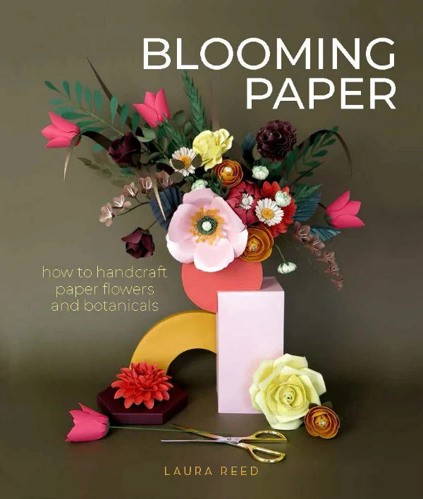 cover of Blooming Paper book showing multicolor, multi-floral bouquet and pair of scissors