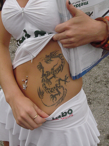 Tribal Dragon Tattoo Design on Girls Side body