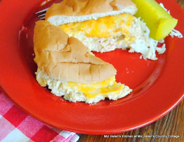 Slow Cooker Cheesy Ranch Chicken Sandwich is a flavorful dish that can be used as a sandwich, dip or a main dish. It is a great busy day recipe. Miz Helen's Country Cottage