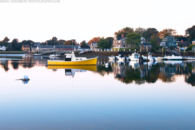 A boat at sunrise in portsmouth harbor