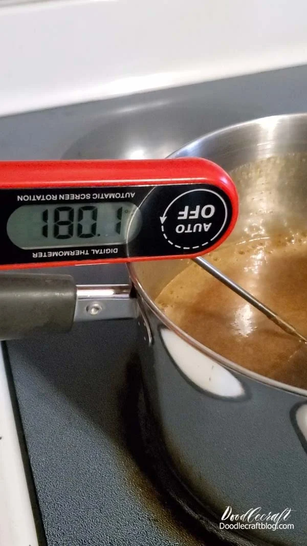 Step 2: Caramel Time  If you have a candy thermometer that's ideal!   Lol, I used my meat thermometer and just duct taped it to the sauce pan.   Let the mixture bubble until it reaches 240*F   Don't stir it.  Don't change the heat. Don't get scared...it takes a long time, but it needs to reach 240*F. It takes about 20-30 minutes of bubbling and popping all over the stove top.