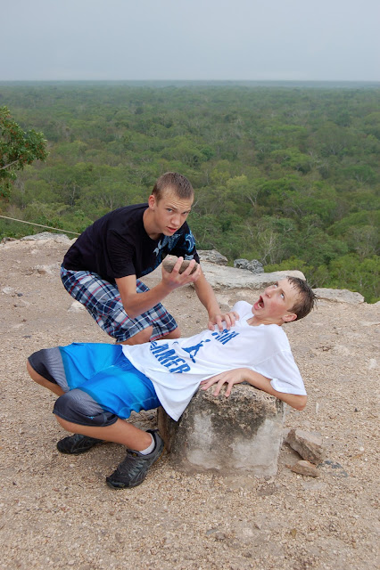 My Sons Performing a Fake Human Sacrifice on the top of the Pyramid Temple of Nohoch Mul in Coba Mexico