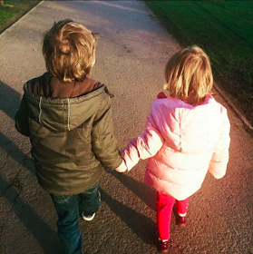 Kids holding hands on valentines day
