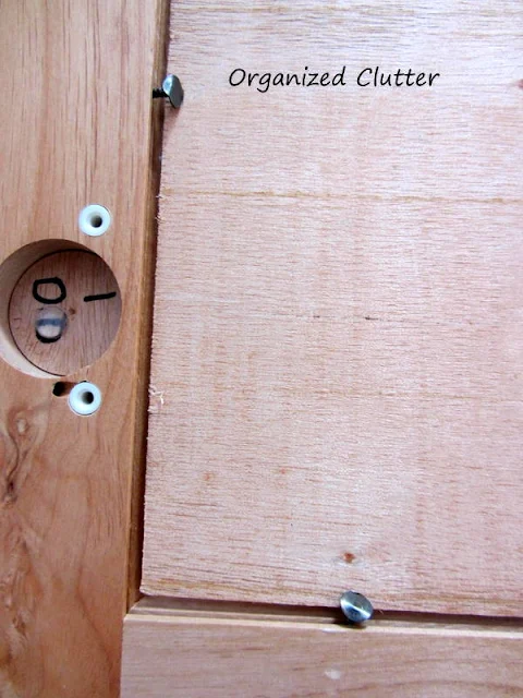Photo of bead board paneling attached to a cabinet frame.