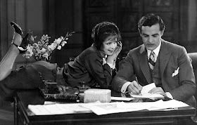 Clara Bow's Betty Lou flirts with her boss Waltham played by Antonio Moreno