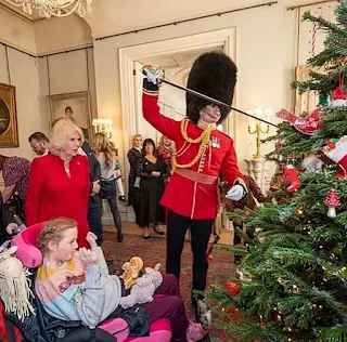 Queen Camilla hosts traditional Christmas tree decorating