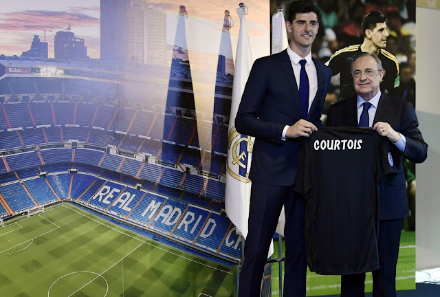 Thibaut Courtois and Real Madrid President Florentino Perez pose for a picture on his unveiling