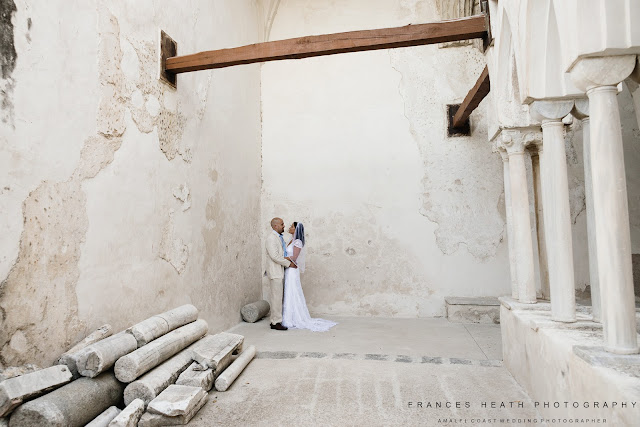 Bride and groom in Hotel Convento cloisters