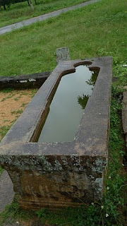 Mihintale, Sri Lanka, granite stone sarcophagus bath tub, ancient hospital