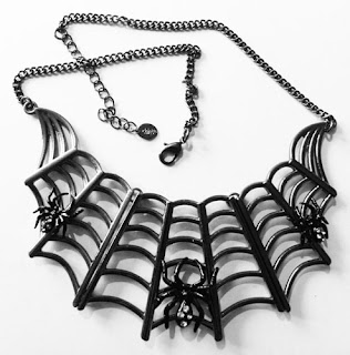 Large black spider web necklace by Claire's Accessories