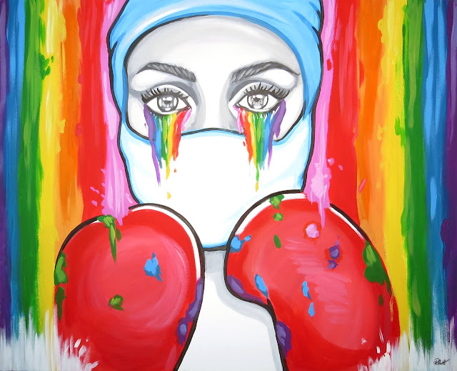 A mural of an NHS nurse, wearing a face mask and boxing gloves, and crying rainbow tears