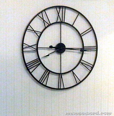 black large roman clock