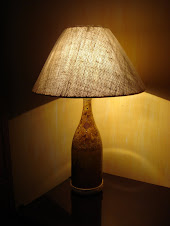 luminária com garrafa de champangnhe