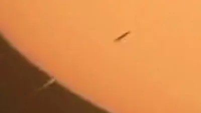 Close up look at the long UFO tube flying past the Sun January 20th 2023.