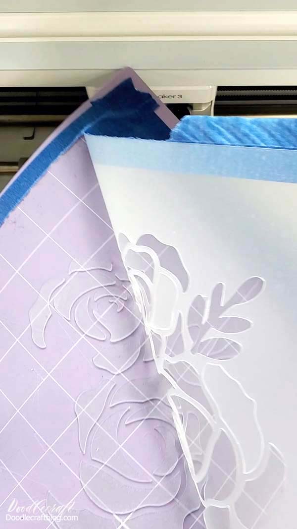 This chopping mat cutting board needed 4 passes to cut all the way through.   Just keep checking in between passes, so you don't cut through your Cricut Mat.   Then peel the newly cut stencil from the mat.   Unpeel the tape and discard it.