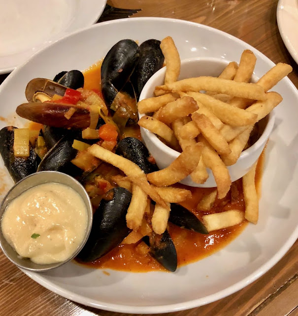 Crispy fries, moules frites, truffle aioli at the Marc Edmonton 