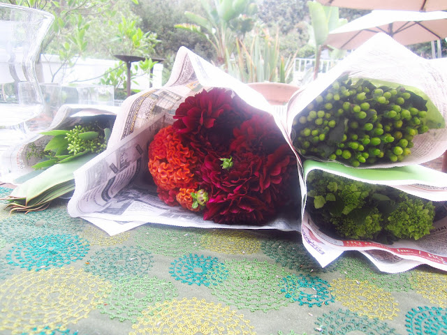 individual bouquets of Dahlias, Cockscomb, Baby Hydrangea, Seeded Eucalyptus, Coffee Beans and Tea Leaves from the flower market