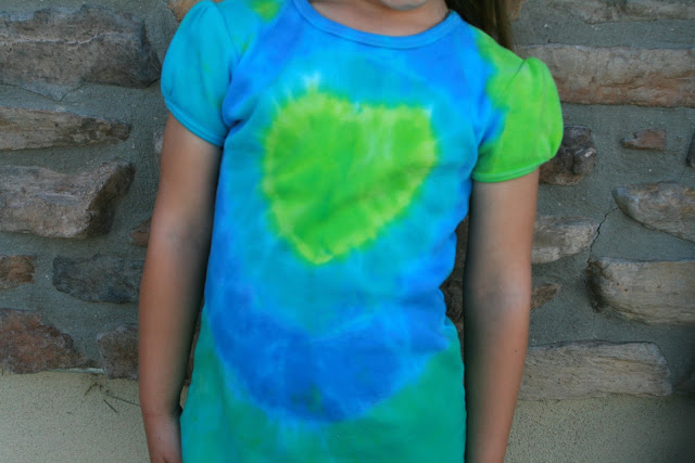 What says summer more than tie dye t-shirts?  See how easy it is and create some fun memories with your kids!