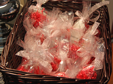 Cherry blossom scented lotion and some pinkwrapped chocolates