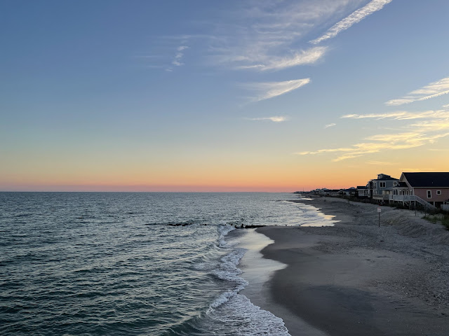 A view of the ocean at twilight on the right of our table at the restaurant we ate at on that first night.