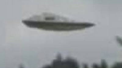Close up look of the white UFO hovering over Dallas Oregon USA in 2012.