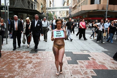 Tattooed Model Stands For PETA Protest