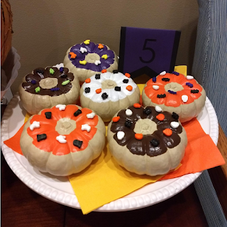 Photo of pumpkin decorated as donuts