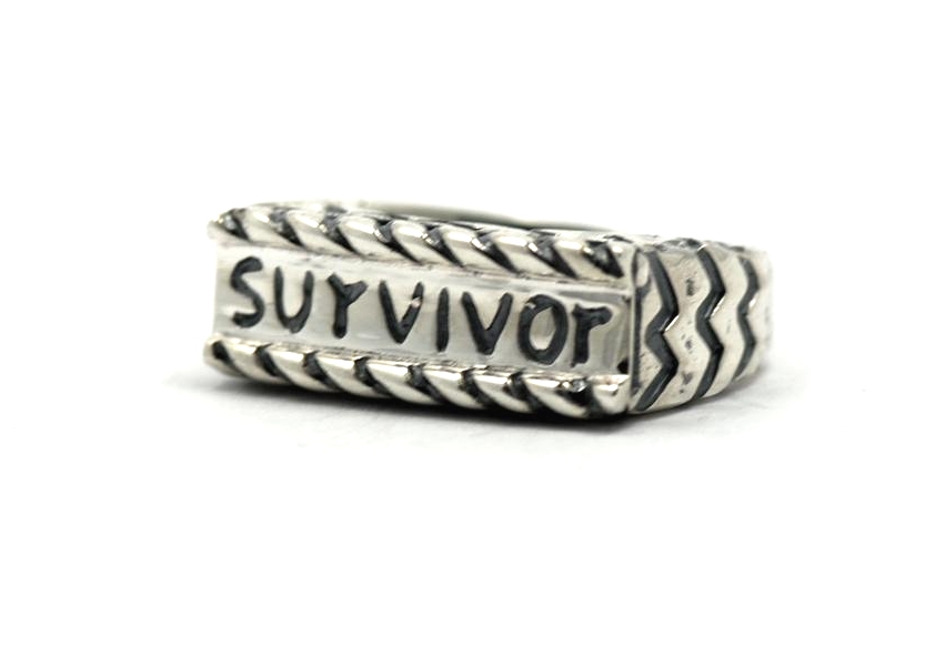 Dian Malouf designed the Go Girl ring and Survivor rings as a special ...