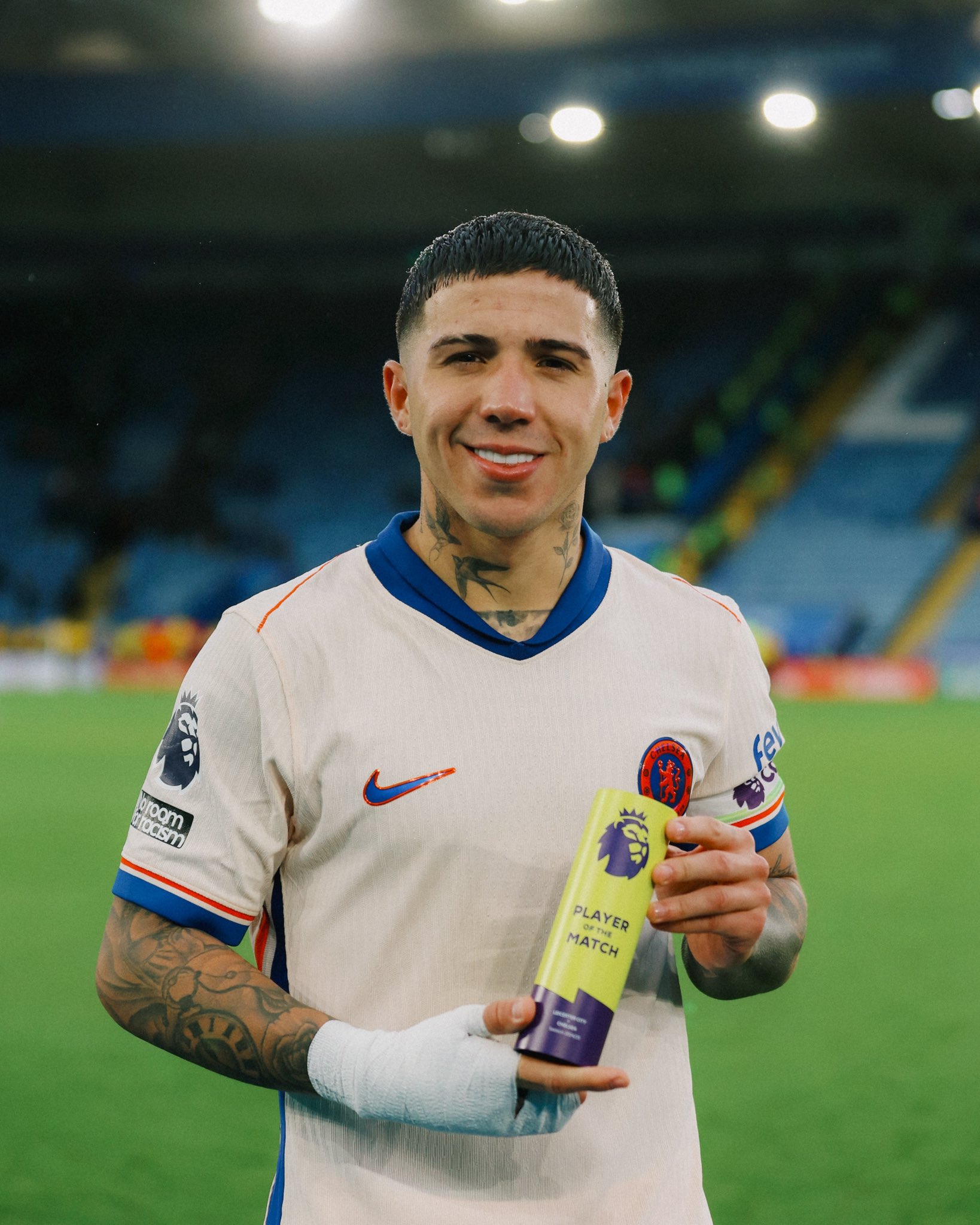 Chelsea midfielder, Enzo Fernandez, takes a shot with his Player Of The Match award following his beautiful display for the Blues in the Premier League 2024/25 match against Leicester City on Saturday 23 November, 2024 at King Power Stadium