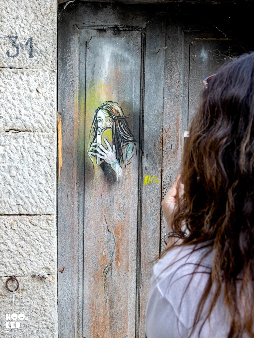 Italian Street Artist Alice Pasquini stencil work in Civita Campomarano