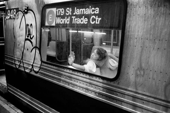 Hand on Subway Car Window