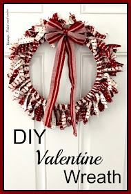 a wreath made from an embroidery hoop and strips of fabric for Valentine decor