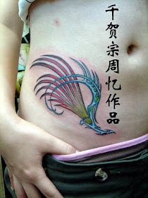 Phoenix Tattoo Design on Girl Abdomen