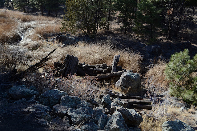 bits of a wooden railroad trestle