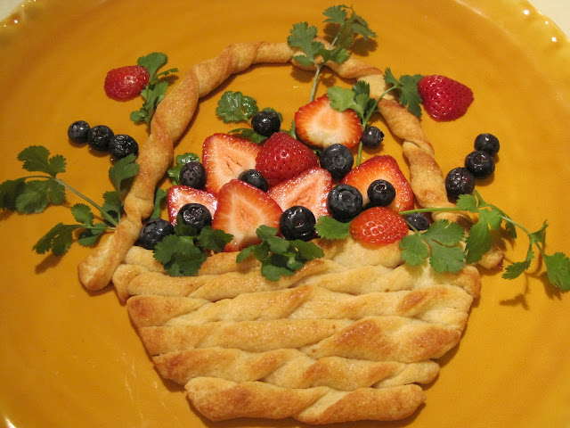 an edible bread basket with a fruit arrangement