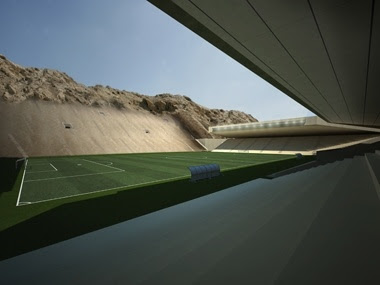 the rock stadium image, weird football stadium UAE, strange football stadium UAE