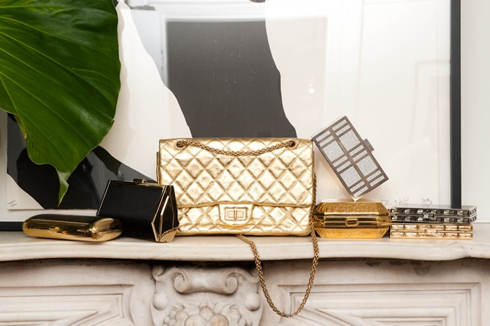 Mary Alice Stephenson gold Chanel purse and gold designer purses