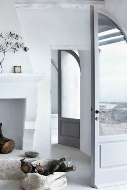 Arched doors in an Italian Farmhouse - found on Hello Lovely Studio