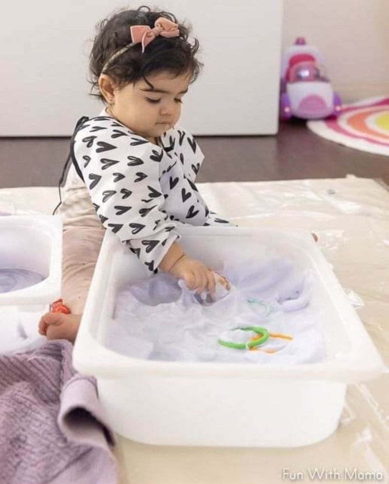 Chickpea foam aquafaba sensory bin for baby.