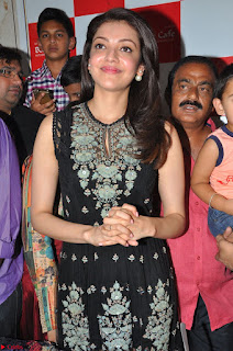 Kajal Aggarwal in lovely Black Sleeveless Anarlaki Dress in Hyderabad at Launch of Bahar Cafe at Madinaguda 006.JPG