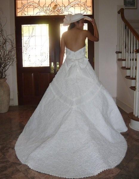  making a spurofthemoment toilet paper dress at a bridal shower