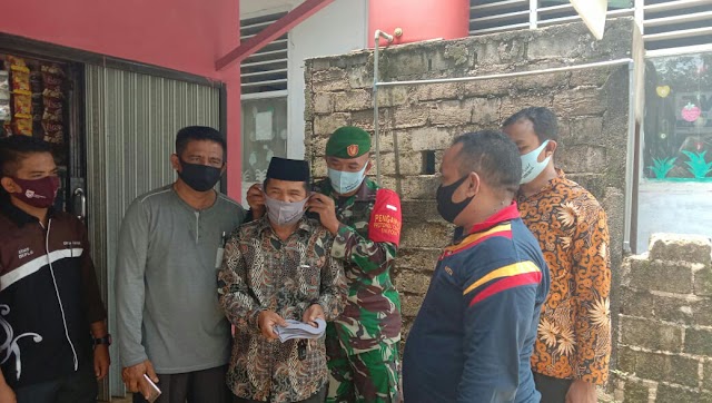 Babinsa Koramil  12/Sangir Kampanyekan 3M Sekaligus Bagi Bagi Masker Untuk Warga