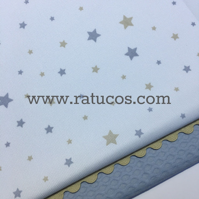 http://ratucos.com/es/telas/7522-pique-canutillo-multi-estrellas-azul.html