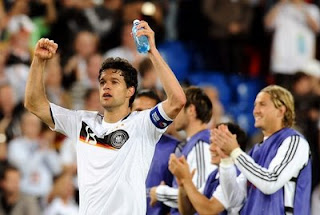 German midfielder Michael Ballack (L) celebrates after winning the Euro 2008 Championships quarter-final football match Portugal vs. Germany