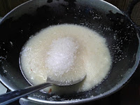  Add sugar to the roasted rava