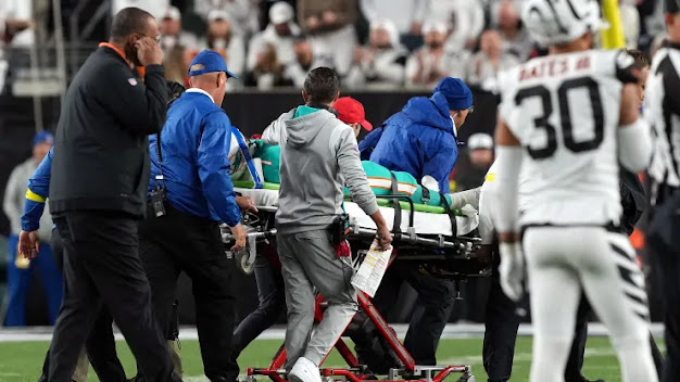 Tua Tagovailoa, the Miami Dolphins quarterback, was carried off due to a head injury.
