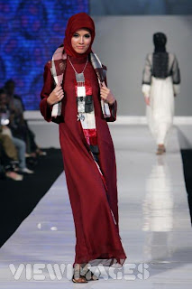 A model showcases Moslem Fashion Designs 